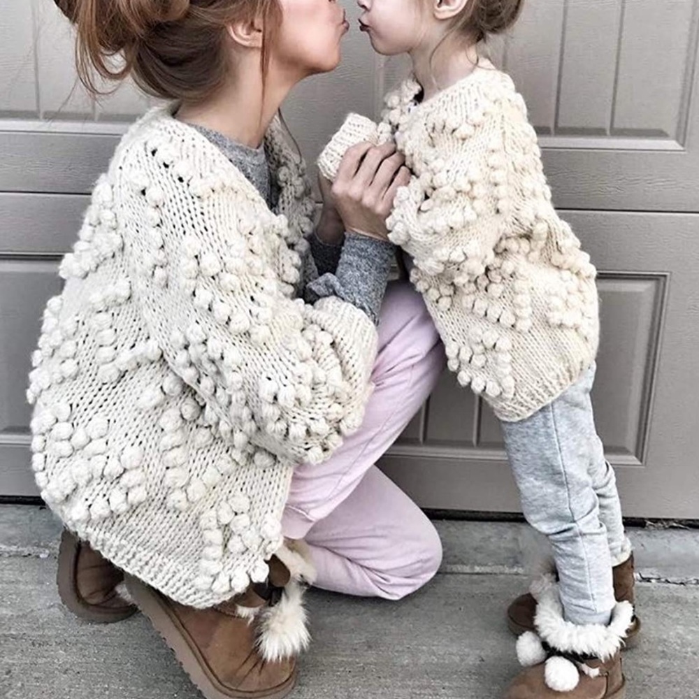 Ivory Knit Cardigan with Pom Pom’s